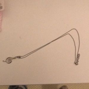 Treble clef necklace